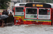 Heavy Rains in Mumbai: Commuters Wade Through Flooded Roads, Trains on Restricted Speed